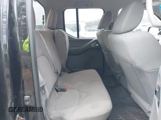 2015 Nissan Frontier SV with VIN 1N6AD0EV1FN766745, listed as a IAAI auction lot 41553521 with 107,919 mi miles and . Bid and sale history available at DreamBid. Image 8.