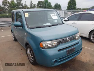 2011 Nissan Cube S z VIN JN8AZ2KR1BT207245, wystawiony jako IAAI lot #42429905 z przebiegiem 119 598 mil mil oraz . Historia ofert i sprzedaży dostępna na DreamBid. Obrazek 1.