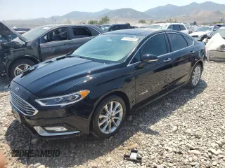 2017 Ford Fusion Hybrid SE with VIN 3FA6P0LU1HR266939, listed as a Copart auction lot 61018305 with 121,293 mi miles and Salvage title. Bid and sale history available at DreamBid. Image 1.