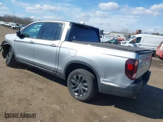 2021 Honda Ridgeline Sport with VIN 5FPYK3F10MB003879, listed as a IAAI auction lot 41677509 with 36,804 mi miles. Bid and sale history available at carsss.com. Image 3.