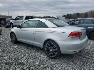 2013 Volkswagen Eos Sport с VIN WVWBW8AH4DV001901, выставлен на аукционе Copart как лот 49924065 с пробегом 60 200 миль миль и Чистый • Clean title. История ставок и продаж доступна на DreamBid. Изображение 2.