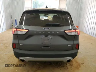 2022 Ford Escape SE with VIN 1FMCU9G66NUA73563, listed as a Copart auction lot 61997355 with 59,077 mi miles and Clean title. Bid and sale history available at DreamBid. Image 6.