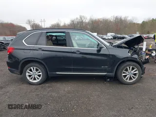 2014 BMW X5 xDrive35i z VIN 5UXKR0C51E0H26528, wystawiony jako IAAI lot #42027626 z przebiegiem 87 228 mil mil oraz . Historia ofert i sprzedaży dostępna na DreamBid. Obrazek 13.