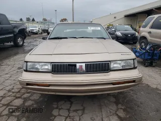1995 Oldsmobile Cutlass Ciera SL z VIN 1G3AJ55MXS6369507, wystawiony jako Copart lot #82143844 z przebiegiem 95 303 mil mil oraz Szkody całkowita. Historia ofert i sprzedaży dostępna na DreamBid. Obrazek 5.