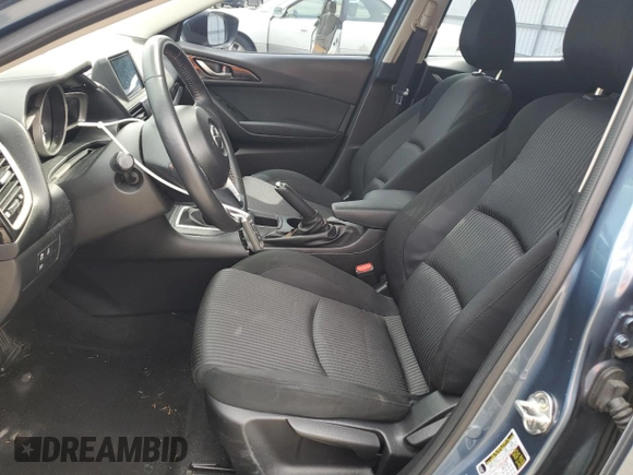 2014 Mazda 3 i Touring with VIN JM1BM1V78E1139884, listed as a Copart auction lot 61826395 with 76,411 mi miles and Salvage title. Bid and sale history available at DreamBid. Image 7.