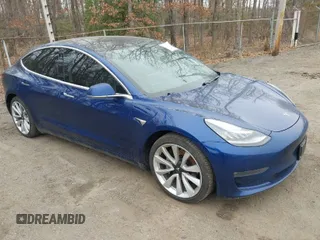 2019 Tesla Model 3 Long Range with VIN 5YJ3E1EB9KF454007, listed as a IAAI auction lot 41769346 with 141,609 mi miles. Bid and sale history available at carsss.com. Image 1.