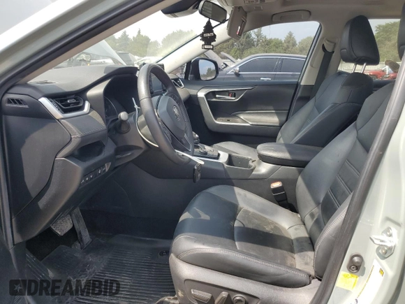 2022 Toyota RAV4 Hybrid XLE Premium with VIN 4T3B6RFV8NU101319, listed as a Copart auction lot 60987535 with 100,070 mi miles and Salvage title. Bid and sale history available at DreamBid. Image 7.