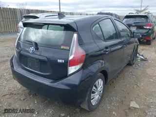 2016 Toyota Prius c One with VIN JTDKDTB33G1137640, listed as a IAAI auction lot 41729098 with 165,366 mi miles. Bid and sale history available at carsss.com. Image 4.
