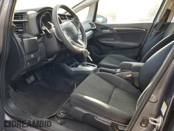 2015 Honda Fit LX with VIN 3HGGK5H51FM714796, listed as a Copart auction lot 83174244 with 121,690 mi miles and Salvage Title. Bid and sale history available at carsss.com. Image 7.