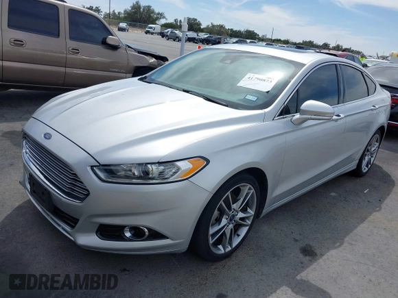 2016 Ford Fusion Titanium with VIN 3FA6P0K90GR132709, listed as a IAAI auction lot 41790873 with 63,269 mi miles and . Bid and sale history available at carsss.com. Image 2.