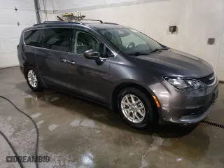 2021 Chrysler Voyager LXI with VIN 2C4RC1DG5MR523411, listed as a Copart auction lot 51864975 with 94,374 mi miles and Clean Title. Bid and sale history available at carsss.com. Image 4.