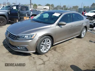 2017 Volkswagen Passat SE with VIN 1VWGT7A36HC084422, listed as a IAAI auction lot 42650872 with 135,203 mi miles and . Bid and sale history available at DreamBid. Image 2.