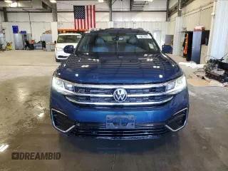 2021 Volkswagen Atlas SE z VIN 1V2ME2CAXMC239951, wystawiony jako Copart lot #57792765 z przebiegiem 65 242 mil mil oraz Czysty tytuł • Clean title. Historia ofert i sprzedaży dostępna na DreamBid. Obrazek 5.