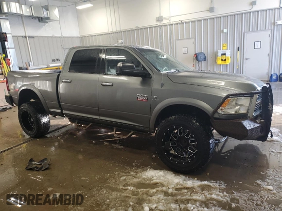 2012 Ram 2500 Laramie with VIN 3C6UD5FL1CG257194, listed as a Copart auction lot 41865975 with 341,556 mi miles and Clean Title. Bid and sale history available at carsss.com. Image 4.