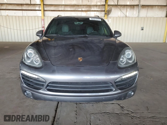2012 Porsche Cayenne S Hybrid z VIN WP1AE2A27CLA92565, wystawiony jako Copart lot #82221214 z przebiegiem 130 210 mil mil oraz Szkody całkowita. Historia ofert i sprzedaży dostępna na DreamBid. Obrazek 5.