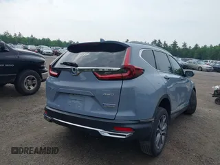 2021 Honda CR-V Touring with VIN 7FART6H91ME022993, listed as a IAAI auction lot 42439344 with 30,477 mi miles and . Bid and sale history available at DreamBid. Image 4.