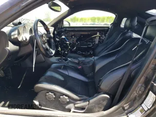 2005 Nissan 350Z Enthusiast z VIN JN1AZ34DX5M607390, wystawiony jako Copart lot #57277905 z przebiegiem 97 629 mil mil oraz Tytuł czysty. Historia ofert i sprzedaży dostępna na DreamBid. Obrazek 10.