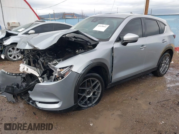 2018 Mazda CX-5 Grand Touring с VIN JM3KFBDM8J0326492, выставлен на аукционе IAAI как лот 40928841 с пробегом 114 848 миль миль и . История ставок и продаж доступна на DreamBid. Изображение 18.