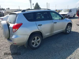 2006 Toyota RAV4 with VIN JTMZD33V965027925, listed as a IAAI auction lot 42084713 with 209,994 mi miles. Bid and sale history available at carsss.com. Image 4.