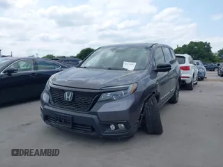 2021 Honda Passport EX-L z VIN 5FNYF7H53MB008238, wystawiony jako IAAI lot #42017959 z przebiegiem 55 411 mil mil oraz . Historia ofert i sprzedaży dostępna na DreamBid. Obrazek 2.