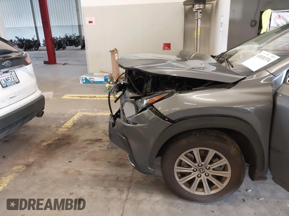 2021 Lexus NX with VIN JTJDARDZ5M2262793, listed as a IAAI auction lot 41831374 with 26,714 mi miles. Bid and sale history available at carsss.com. Image 6.