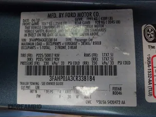 2012 Ford Fusion SEL z VIN 3FAHP0JA3CR338184, wystawiony jako IAAI lot #42253084 z przebiegiem 179 056 mil mil oraz . Historia ofert i sprzedaży dostępna na DreamBid. Obrazek 9.