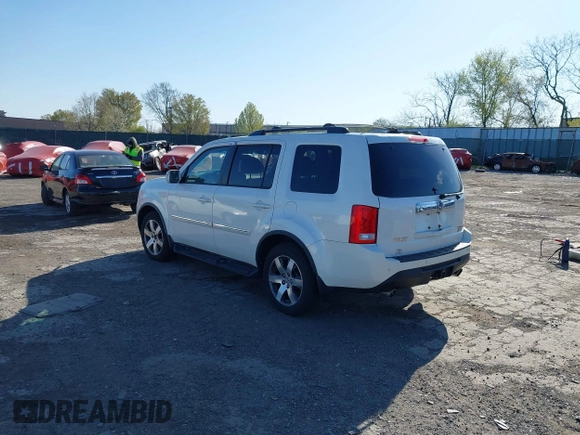 2012 Honda Pilot Touring with VIN 5FNYF4H98CB057659, listed as a IAAI auction lot 41927990 with 140,000 mi miles. Bid and sale history available at carsss.com. Image 3.