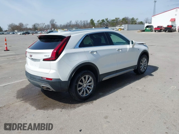 2020 Cadillac XT4 AWD Premium Luxury z VIN 1GYFZDR44LF036461, wystawiony jako IAAI lot #41934371 z przebiegiem 90 545 mil mil oraz . Historia ofert i sprzedaży dostępna na DreamBid. Obrazek 4.