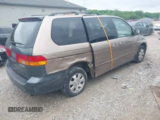 2003 Honda Odyssey EX-L z VIN 5FNRL18973B122173, wystawiony jako IAAI lot #42252018 z przebiegiem 204 487 mil mil oraz . Historia ofert i sprzedaży dostępna na DreamBid. Obrazek 4.