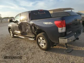 2012 Toyota Tundra 4WD Truck with VIN 5TFDM5F13CX039552, listed as a Copart auction lot 81399594 with 167,461 mi miles and Salvage Title. Bid and sale history available at carsss.com. Image 2.