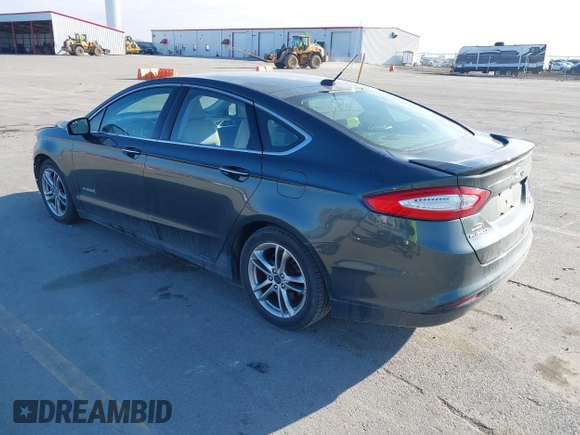 2016 Ford Fusion Titanium Hybrid with VIN 3FA6P0RU6GR156622, listed as a IAAI auction lot 41178887 with 92,423 mi miles. Bid and sale history available at carsss.com. Image 3.