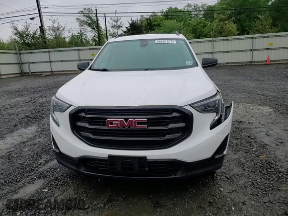 2021 GMC Terrain SLE with VIN 3GKALTEV5ML386042, listed as a Copart auction lot 56867875 with 63,859 mi miles and Salvage title. Bid and sale history available at DreamBid. Image 14.
