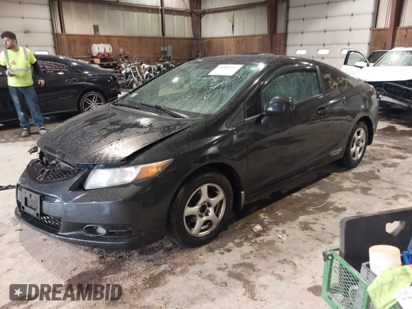 2012 Honda Civic Cpe LX with VIN 2HGFG3B54CH547967, listed as a IAAI auction lot 41083787 with 146,648 mi miles. Bid and sale history available at carsss.com. Image 2.
