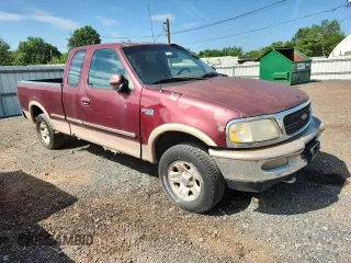 1997 Ford F-150 XL z VIN 1FTDX186XVKB29967, wystawiony jako Copart lot #63531805 z przebiegiem 178 616 mil mil oraz Czysty tytuł • Clean title. Historia ofert i sprzedaży dostępna na DreamBid. Obrazek 4.