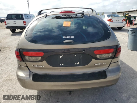2003 Mercury Sable LS Premium z VIN 1MEFM59S03A606329, wystawiony jako Copart lot #79331624 z przebiegiem 152 059 mil mil oraz Nie do naprawy. Historia ofert i sprzedaży dostępna na DreamBid. Obrazek 6.