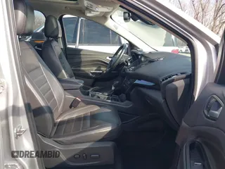 2017 Ford Escape Titanium with VIN 1FMCU0JD3HUB13234, listed as a IAAI auction lot 41760944 with 113,361 mi miles. Bid and sale history available at carsss.com. Image 5.