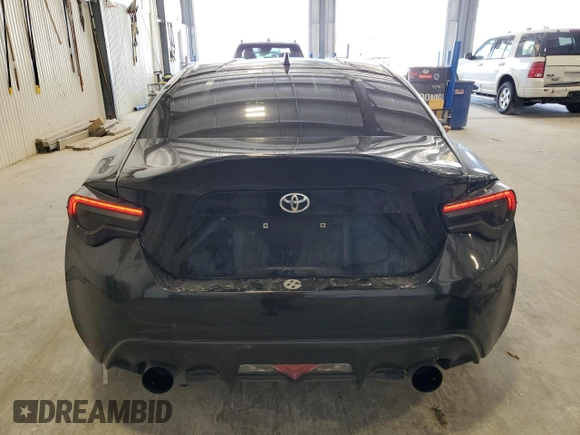 2017 Toyota 86 z VIN JF1ZNAA10H8703123, wystawiony jako Copart lot #56401965 z przebiegiem 75 184 mil mil oraz Szkody całkowita. Historia ofert i sprzedaży dostępna na DreamBid. Obrazek 6.