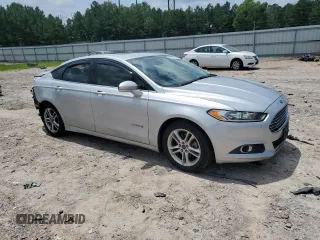 2015 Ford Fusion SE Hybrid with VIN 3FA6P0LU4FR301714, listed as a Copart auction lot 64370525 with 174,076 mi miles and Clean title. Bid and sale history available at DreamBid. Image 4.