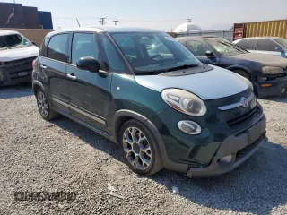 2014 FIAT 500L Trekking with VIN ZFBCFADH4EZ010196, listed as a Copart auction lot 62566094 with 128,519 mi miles and Salvage Title. Bid and sale history available at carsss.com. Image 4.
