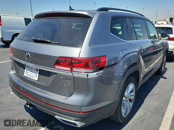 2023 Volkswagen Atlas SE z VIN 1V2HR2CA5PC526012, wystawiony jako IAAI lot #42796408 z przebiegiem 41 216 mil mil oraz . Historia ofert i sprzedaży dostępna na DreamBid. Obrazek 29.