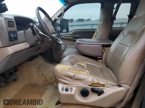 1999 Ford F-250 XL with VIN 1FTNX20FXXEA40858, listed as a Copart auction lot 63296925 with 368,565 mi miles and Salvage title. Bid and sale history available at DreamBid. Image 7.