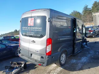 2015 Ford Transit Cargo with VIN 1FTNE2CM5FKB24232, listed as a IAAI auction lot 41333965 with 42,949 mi miles and . Bid and sale history available at carsss.com. Image 4.