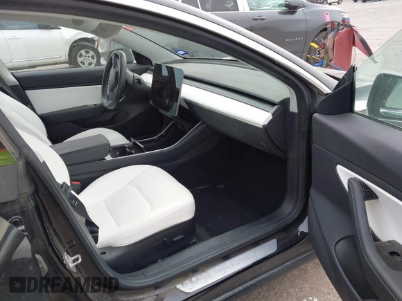 2018 Tesla Model 3 Long Range Battery with VIN 5YJ3E1EB9JF188437, listed as a IAAI auction lot 41371254 with 55,934 mi miles and . Bid and sale history available at DreamBid. Image 5.