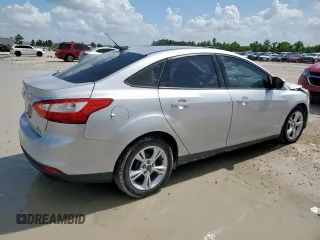 2013 Ford Focus SE with VIN 1FADP3F22DL263124, listed as a Copart auction lot 61583795 with 133,522 mi miles and Salvage title. Bid and sale history available at DreamBid. Image 3.