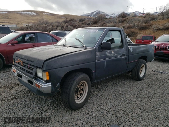 1991 Nissan Frontier with VIN 1N6SD11S9MC419923, listed as a Copart auction lot 85189314 with 245,003 mi miles and Salvage title. Bid and sale history available at DreamBid. Image 1.