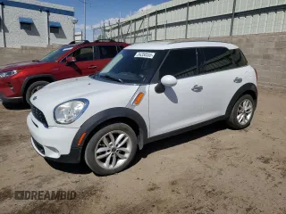 2016 MINI Countryman with VIN WMWZB3C5XGWR49702, listed as a Copart auction lot 54350555 with 68,897 mi miles and Salvage title. Bid and sale history available at DreamBid. Image 1.