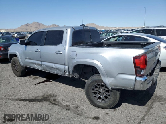 2018 Toyota Tacoma SR5 z VIN 3TMAZ5CN8JM077857, wystawiony jako Copart lot #52570945 z przebiegiem 50 182 mil mil oraz Szkoda całkowita • Salvage title. Historia ofert i sprzedaży dostępna na DreamBid. Obrazek 2.