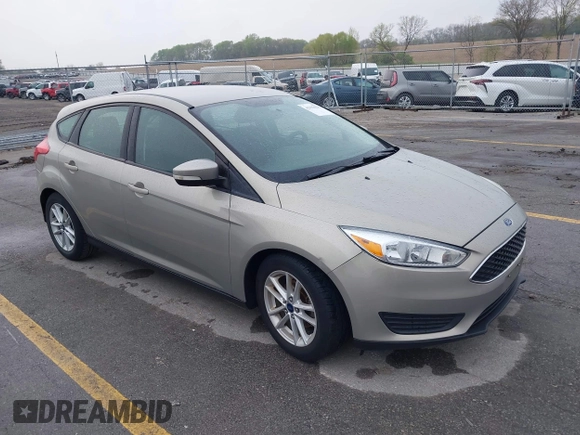 2015 Ford Focus SE with VIN 1FADP3K21FL211511, listed as a IAAI auction lot 42153828 with 126,111 mi miles. Bid and sale history available at carsss.com. Image 1.