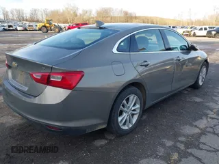 2018 Chevrolet Malibu LT with VIN 1G1ZD5ST8JF126050, listed as a IAAI auction lot 41947596 with 115,964 mi miles and . Bid and sale history available at DreamBid. Image 4.