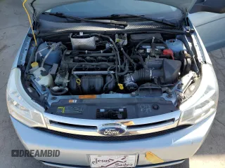 2009 Ford Focus SE z VIN 1FAHP35N69W183425, wystawiony jako Copart lot #54560985 z przebiegiem 159 305 mil mil oraz Szkoda całkowita • Salvage title. Historia ofert i sprzedaży dostępna na DreamBid. Obrazek 11.
